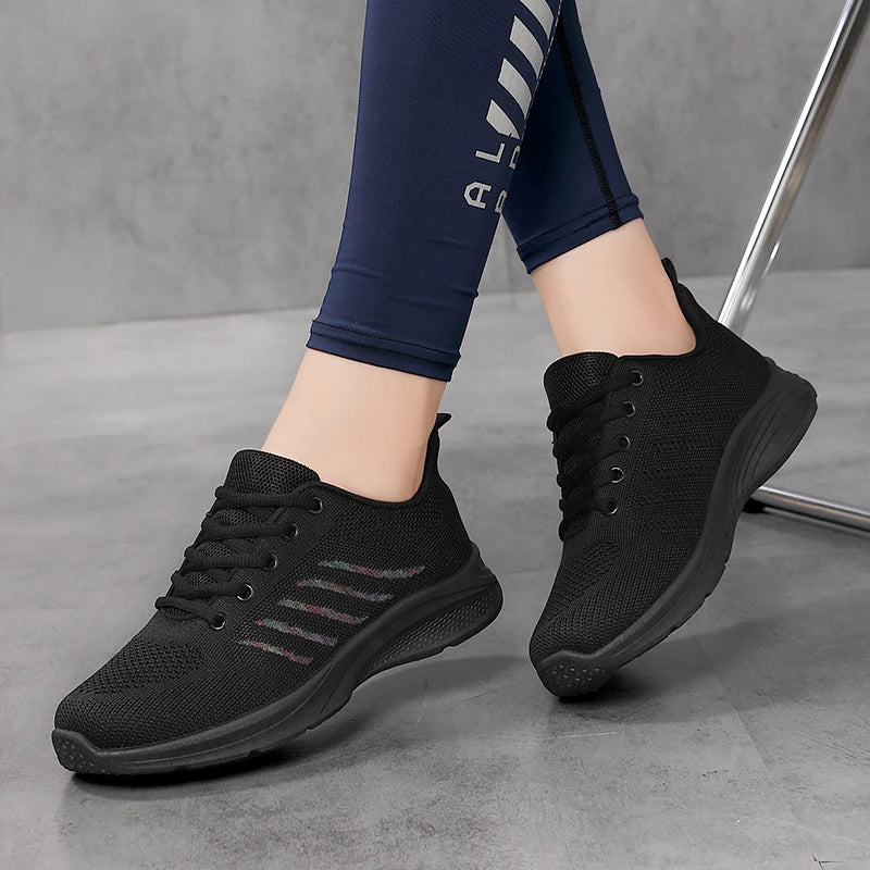 Zapatos deportivos de mujer – mocasines de malla con cuña ligera.