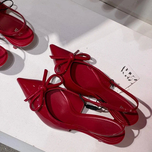 Zapatos de mujer tipo mule de tacón de aguja con lazo - Elegantes y sofisticados.