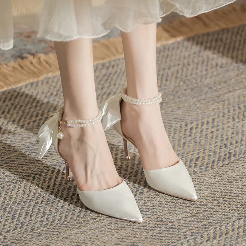 Tacones de fiesta para mujer - Sandalias blancas con perlas y moño mariposa