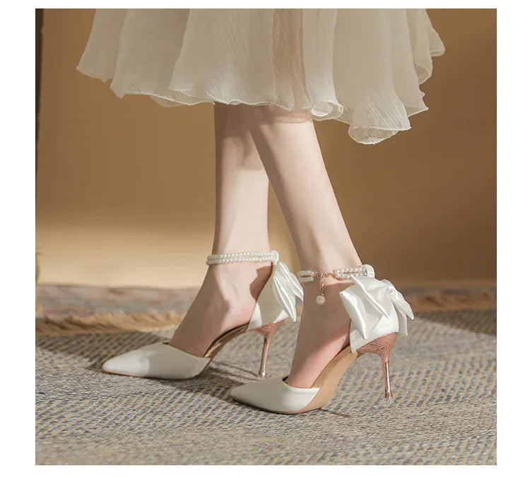 Tacones de fiesta para mujer - Sandalias blancas con perlas y moño mariposa