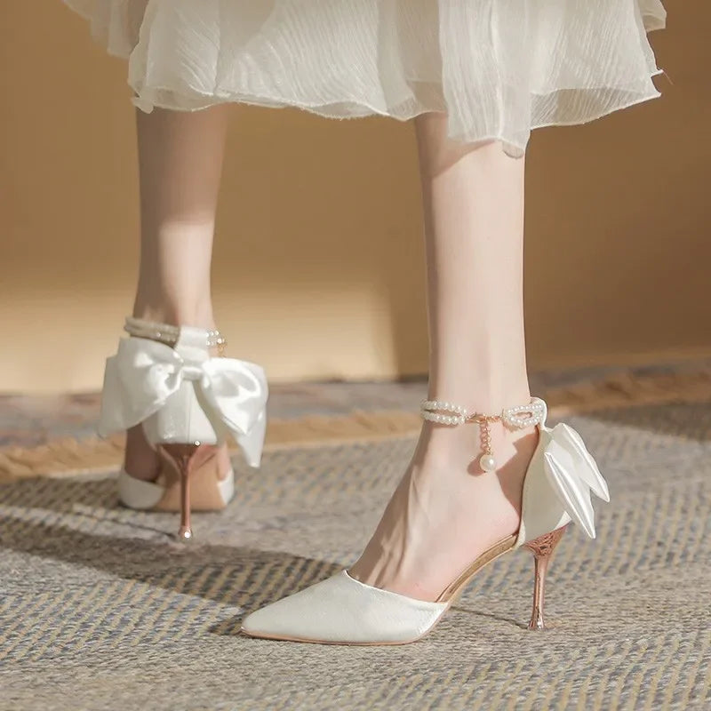 Tacones de fiesta para mujer - Sandalias blancas con perlas y moño mariposa
