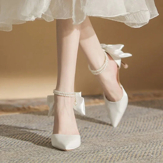 Tacones de fiesta para mujer - Sandalias blancas con perlas y moño mariposa